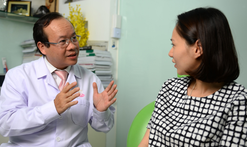 Dr. Vo Van Nhan giving advises and implant treatment at Nhan Tam Dental